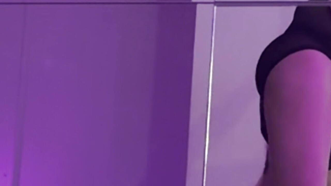 stretching with pylon in bodysuit